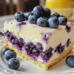 Zitronen-Blaubeer-Kuchen mit Cheesecake-Topping